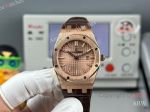 High Quality Replica AUDEMARS PIGUET Royal Oak Brown Leather Strap Rose Gold Grande Tasserie Grid Pattern Face Dial Rose Gold Hexagonal Screw Fixed Case Watch 33mm